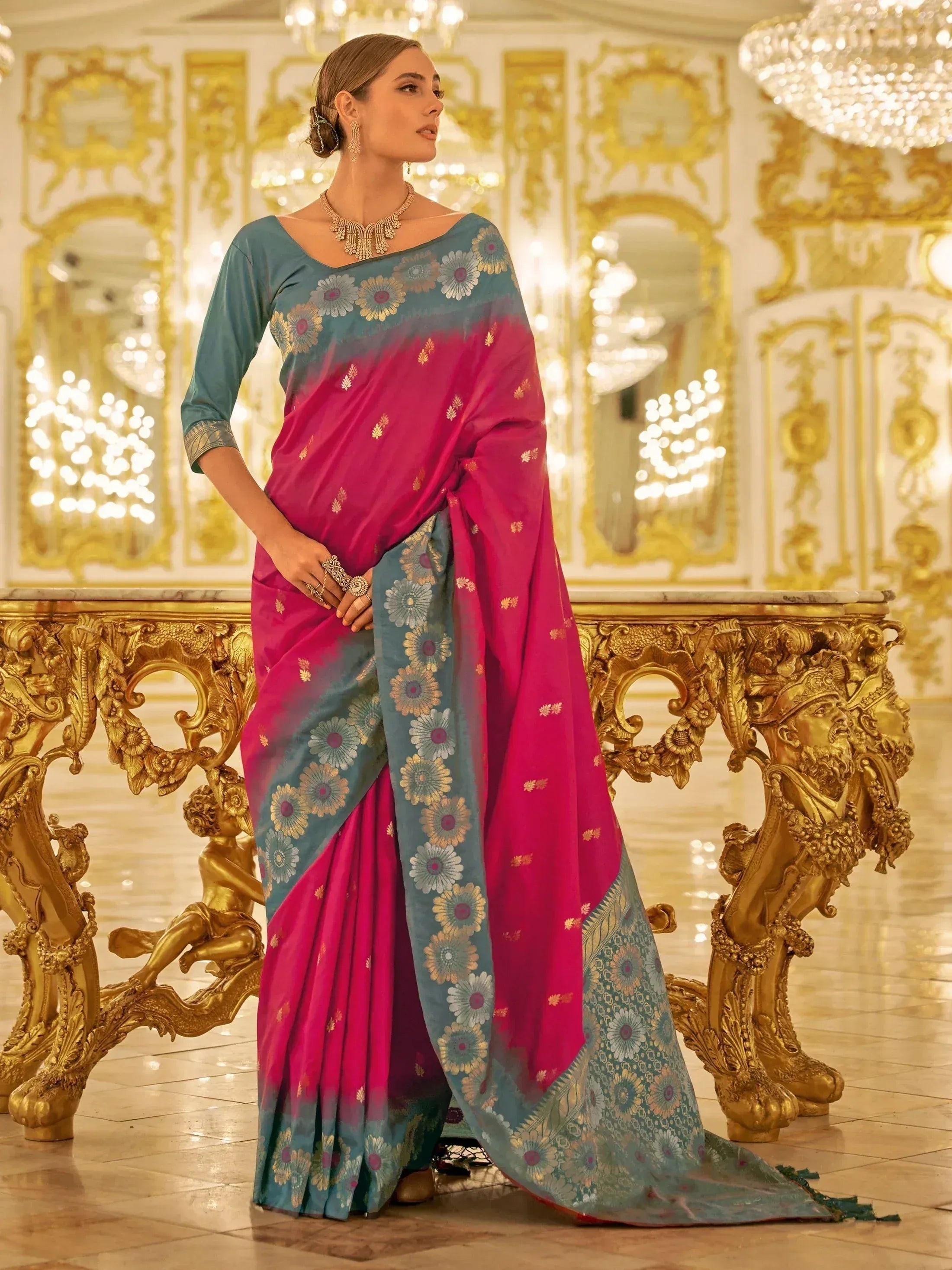 Elegant pink and teal floral saree with gold embroidery, perfect for Indian ethnic wear occasions
