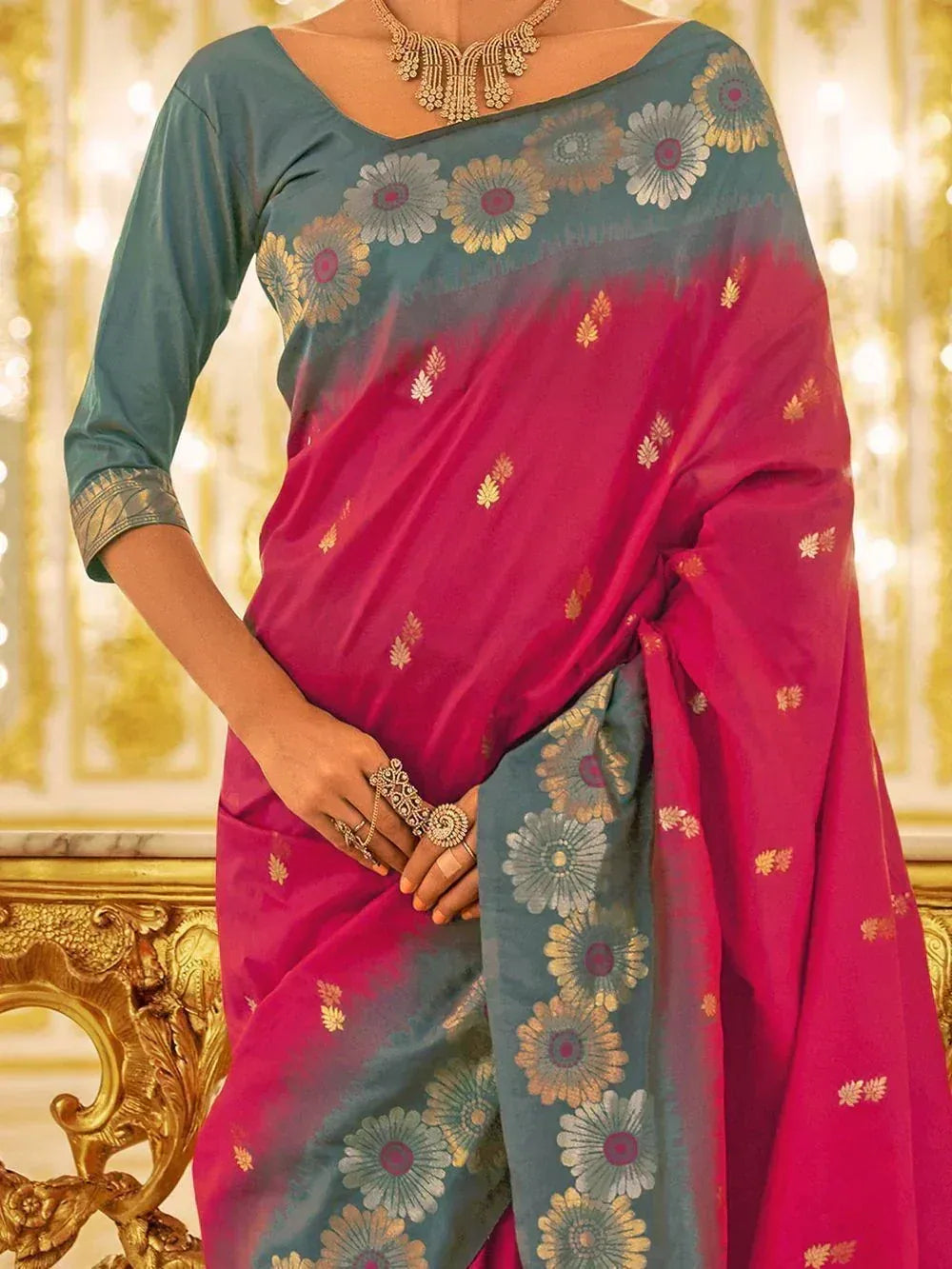 Pink and teal designer saree with floral gold embroidery, perfect for Indian ethnic wear occasions