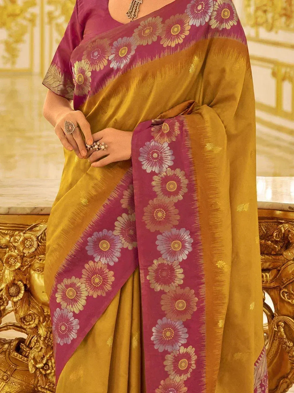 Yellow and magenta floral printed saree with designer border, perfect for ethnic occasions