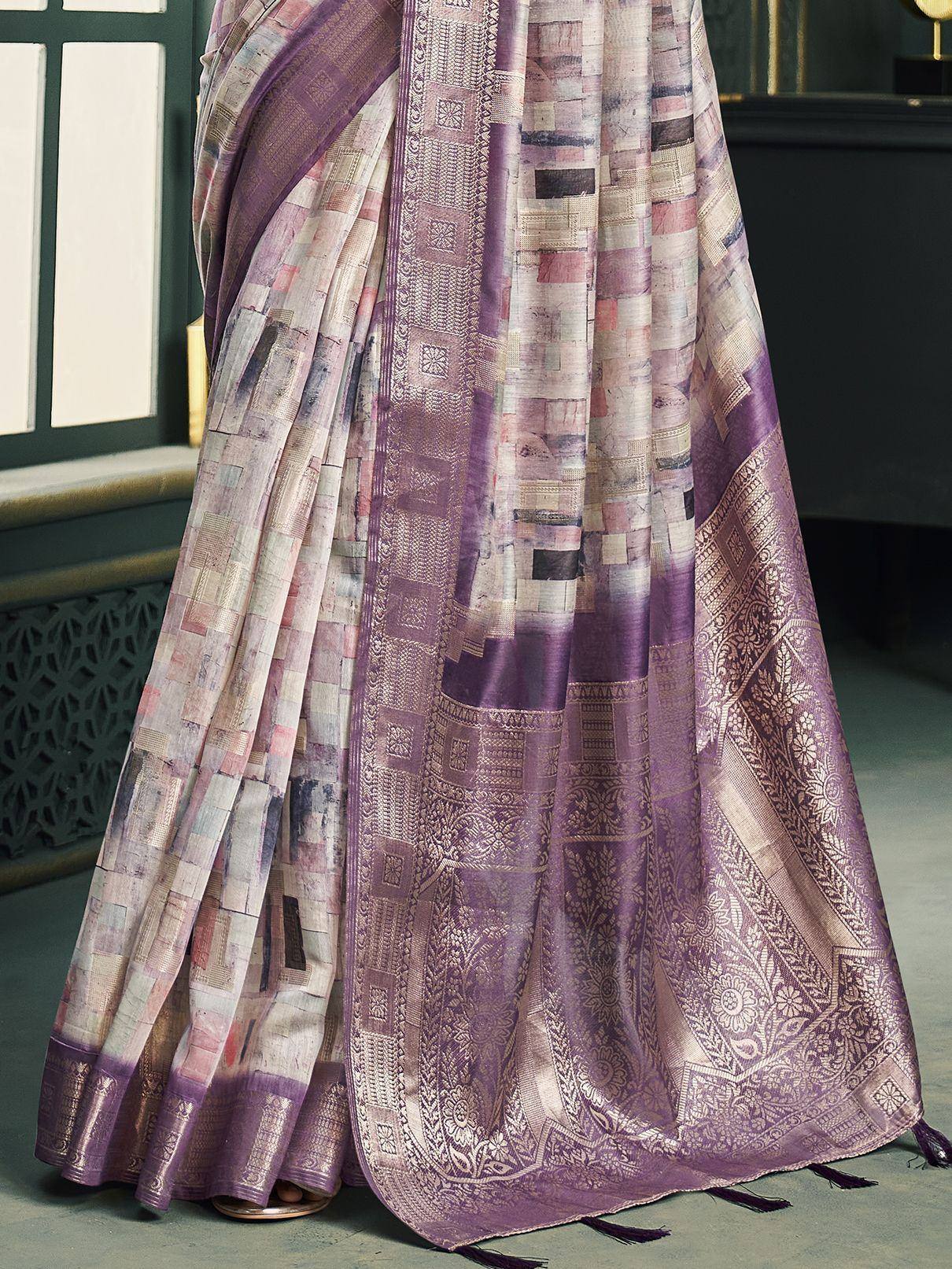 Purple printed saree with intricate border, perfect for ethnic wear and festive occasions