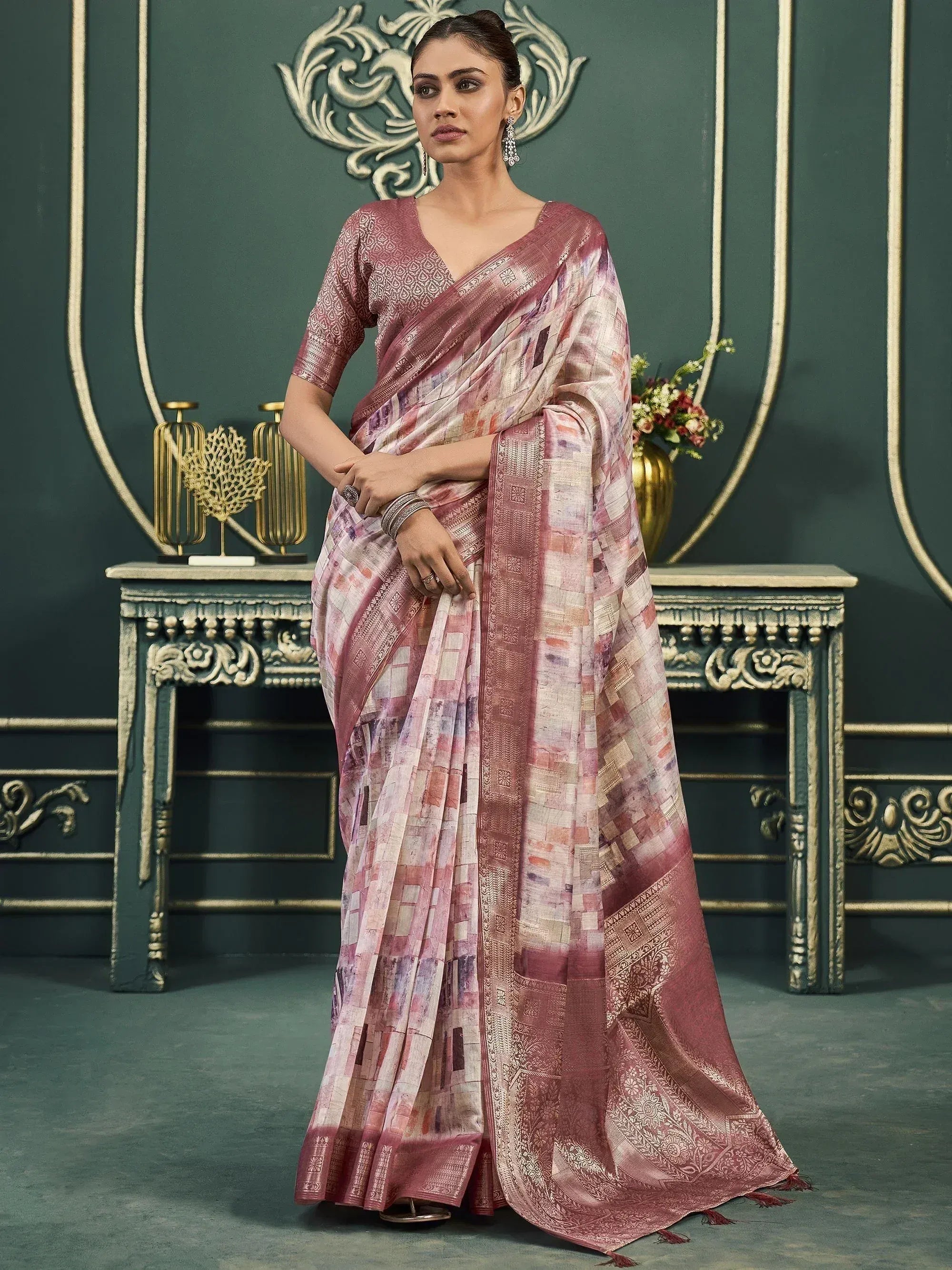 Elegant pink printed saree with gold border, perfect for Indian ethnic wear occasions