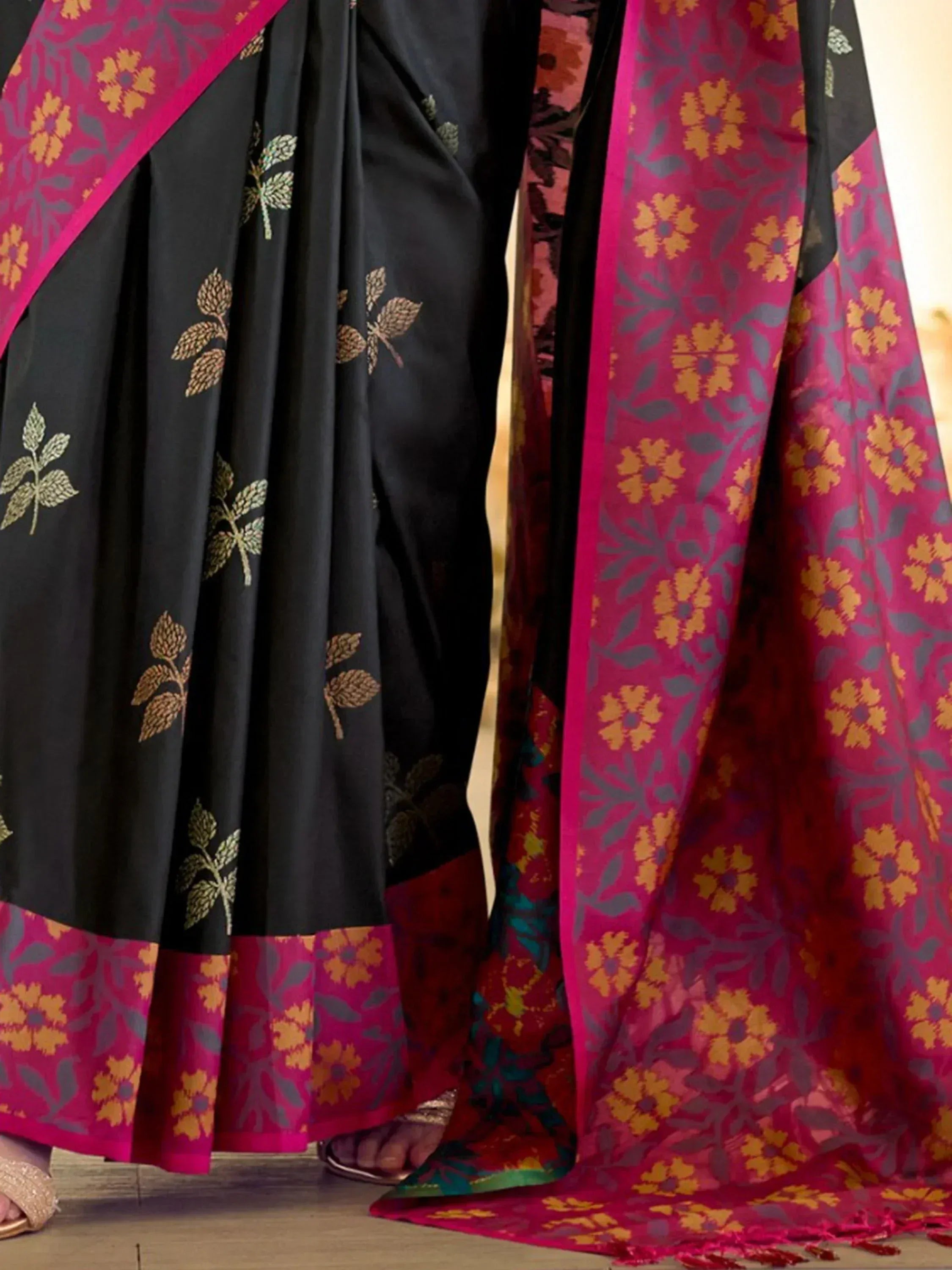 Black saree with gold leaf embroidery and magenta floral border, Indian ethnic wear
