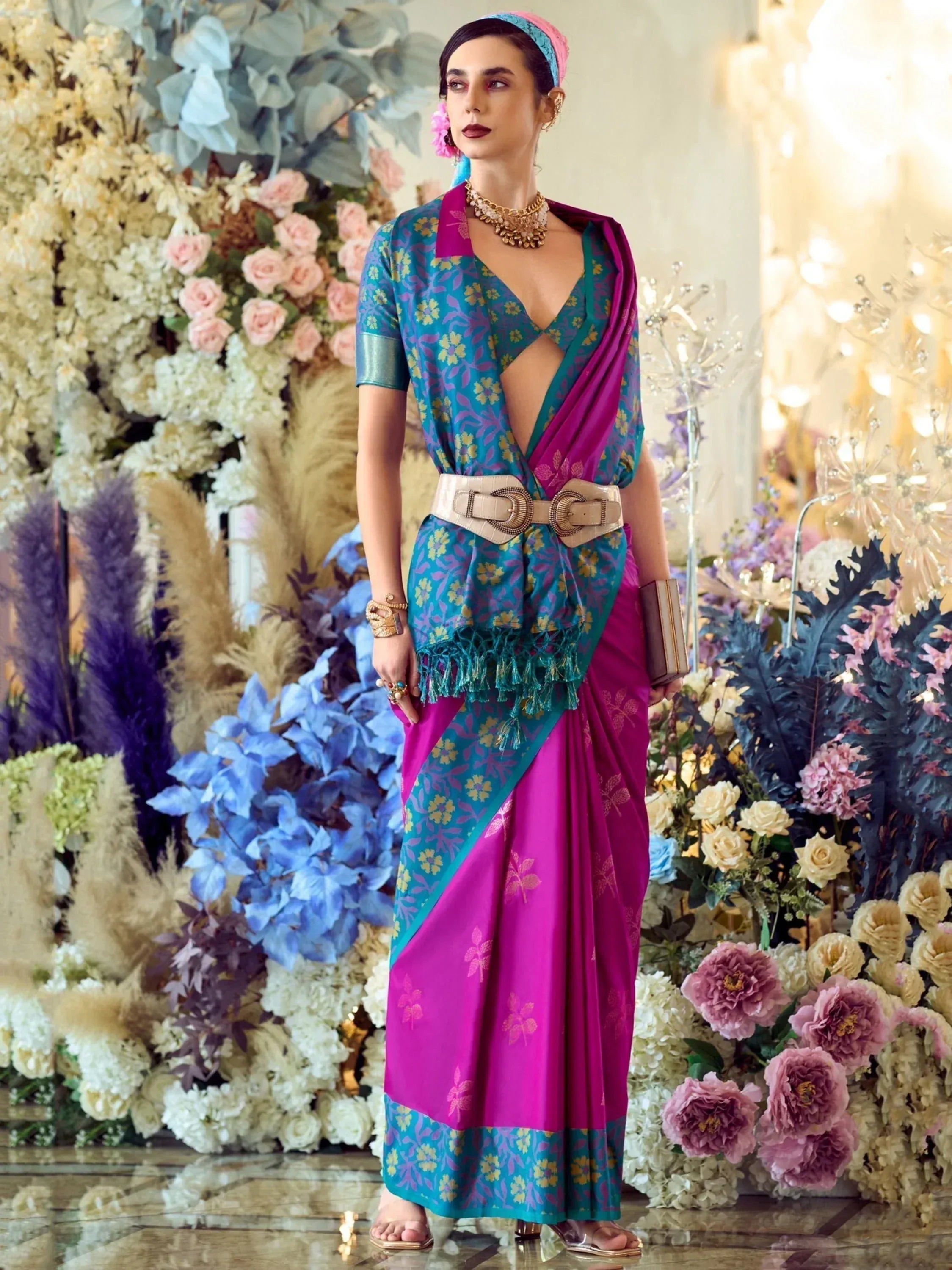 Stylish Indian saree with floral print, pink and teal colors, belt accent, perfect for ethnic events