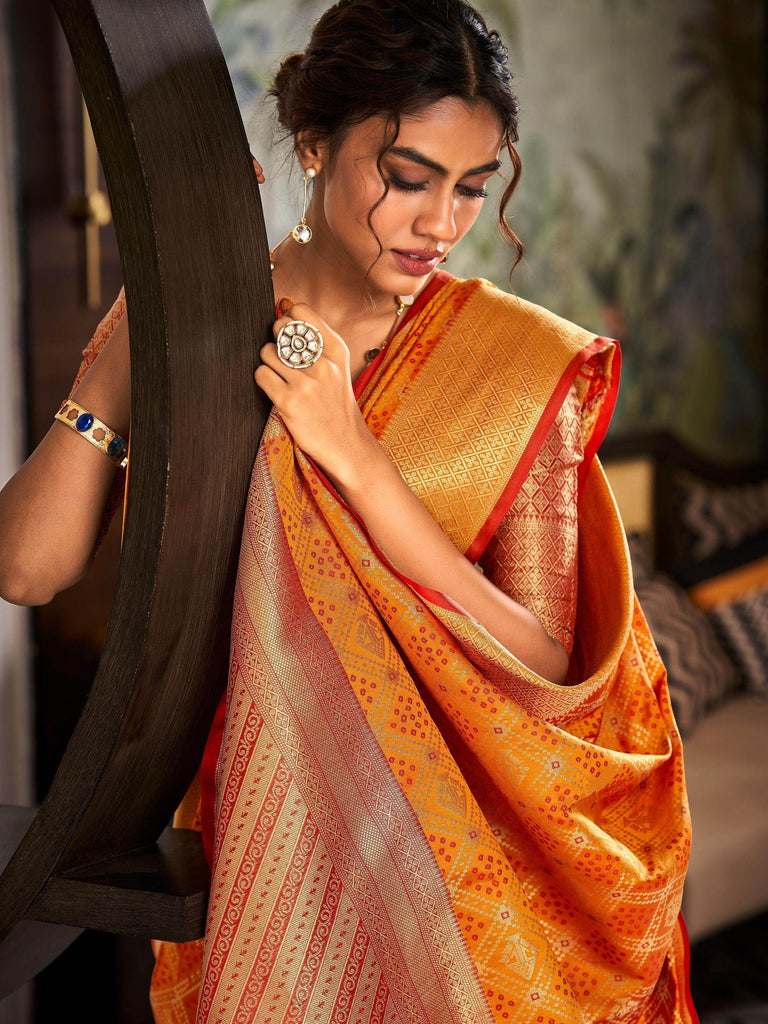 Fabulous Orange Zari Weaving Silk Haldi Wear Saree With Blouse