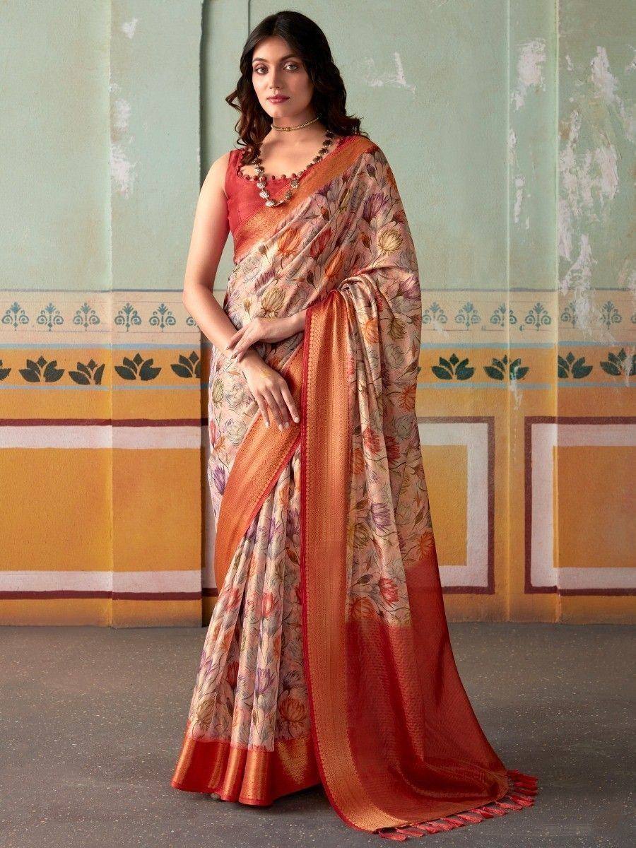 Floral print saree with orange border, styled with matching blouse for Indian ethnic wear