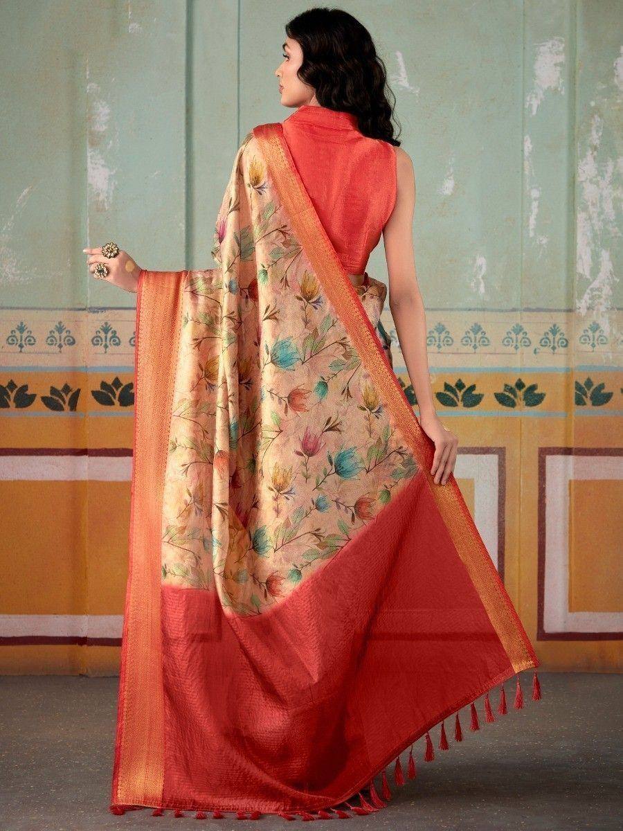 Floral print saree with orange border and tassels, paired with matching blouse, ethnic wear for women