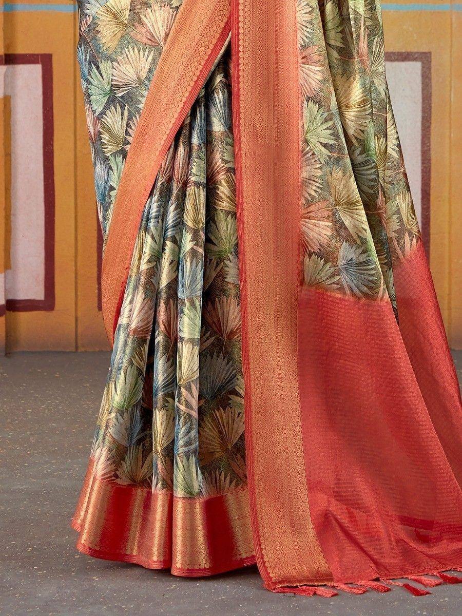 Indian ethnic saree with palm leaf print, orange border, and red pallu, perfect for festive occasions