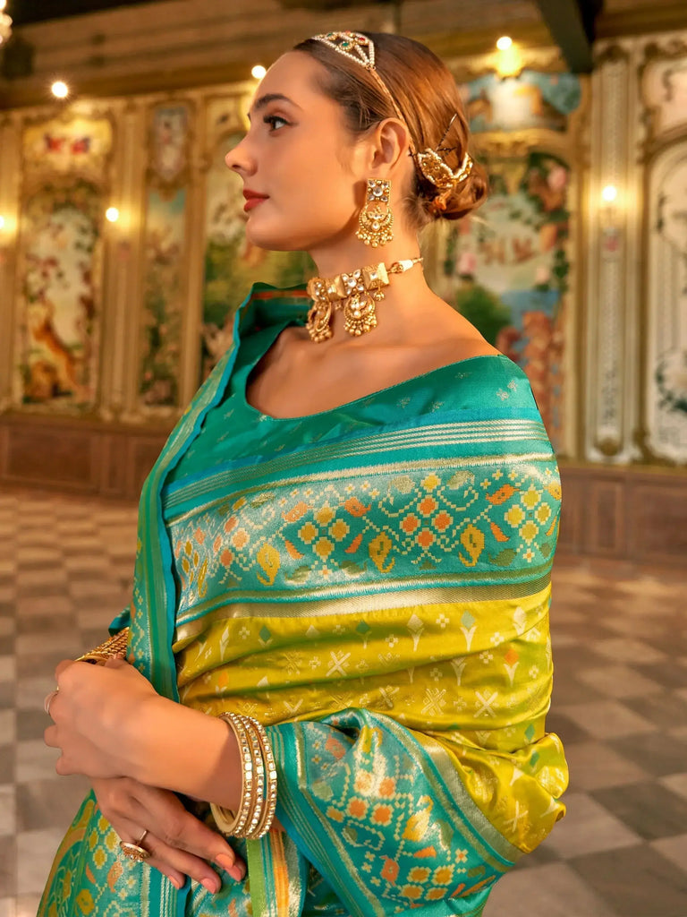 Glamorous Light Green Zari Weaving Banarasi Silk Saree With Blouse
