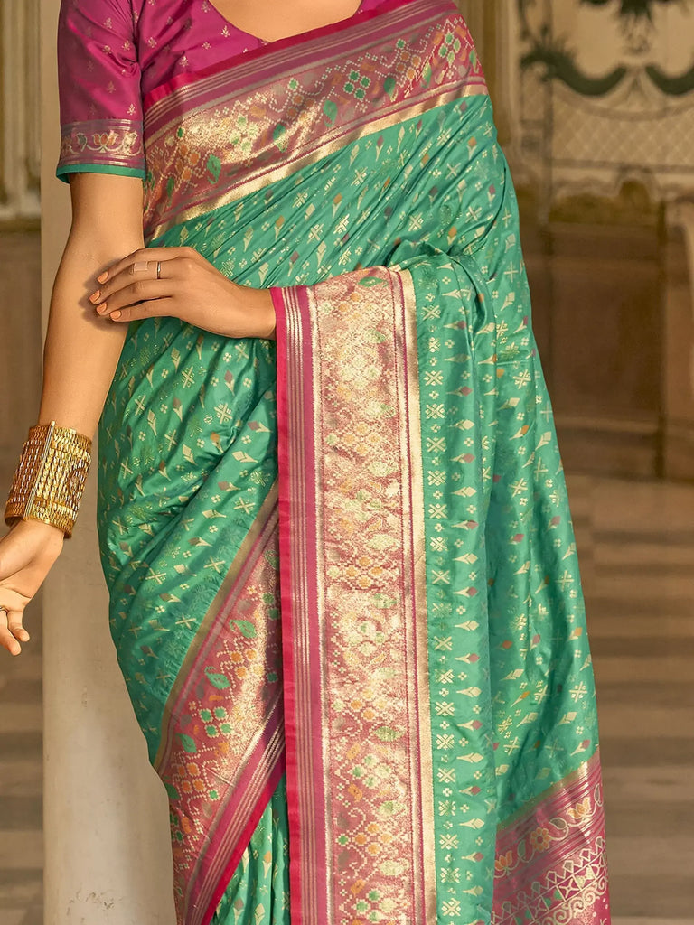 Captivating Teal Green Zari Weaving Banarasi Silk Event Wear Saree