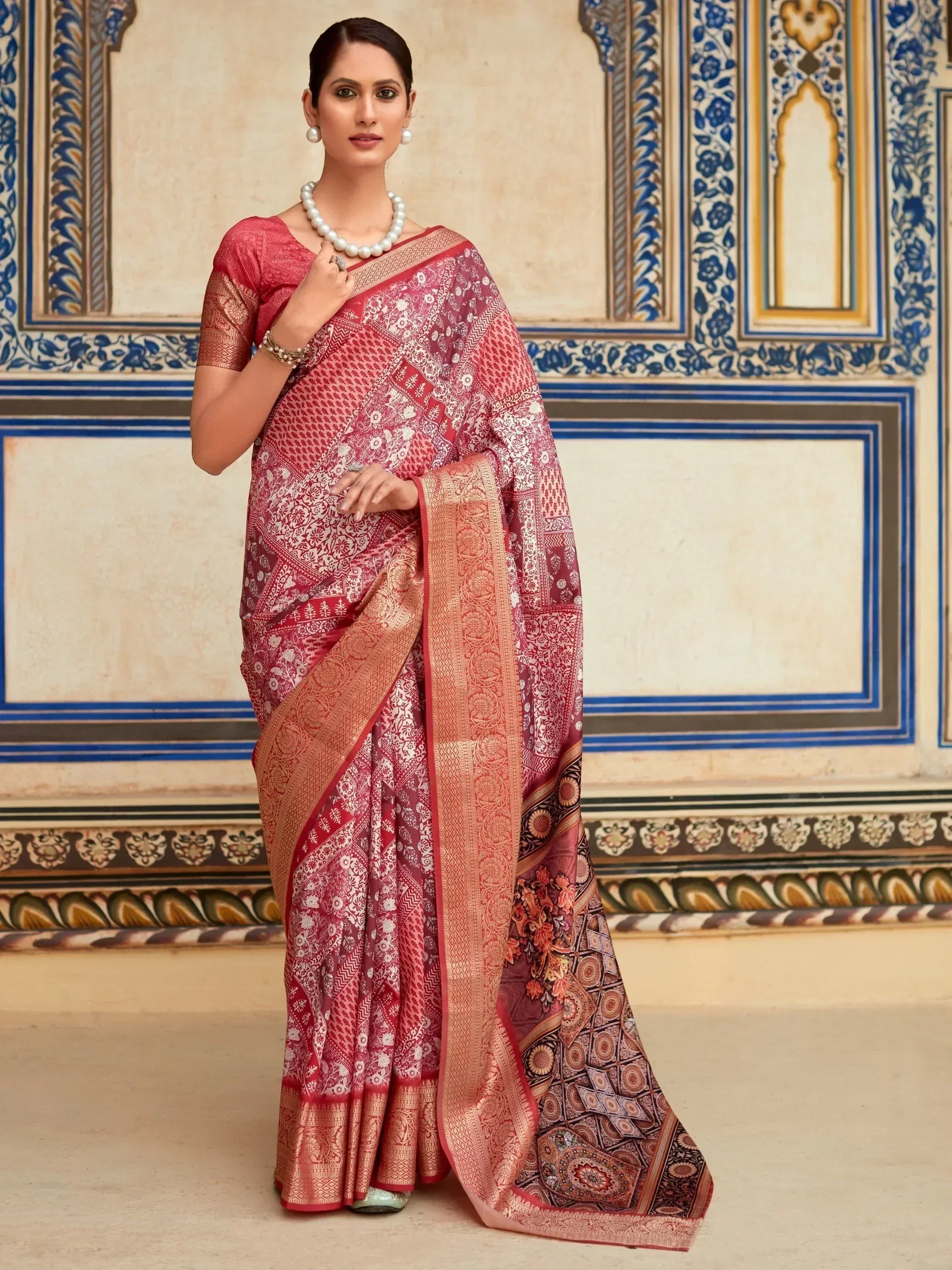 Elegant red and gold printed saree with intricate patterns, perfect for Indian ethnic wear occasions