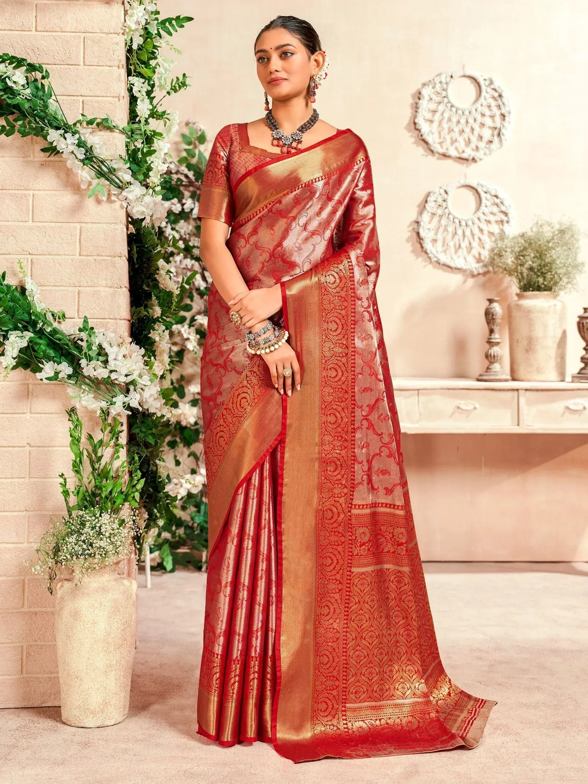 Red and gold designer saree with intricate embroidery, perfect for Indian ethnic wear occasions