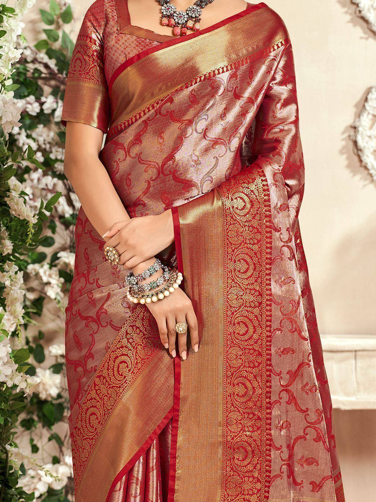 Red and gold designer saree with intricate paisley patterns, perfect for ethnic occasions