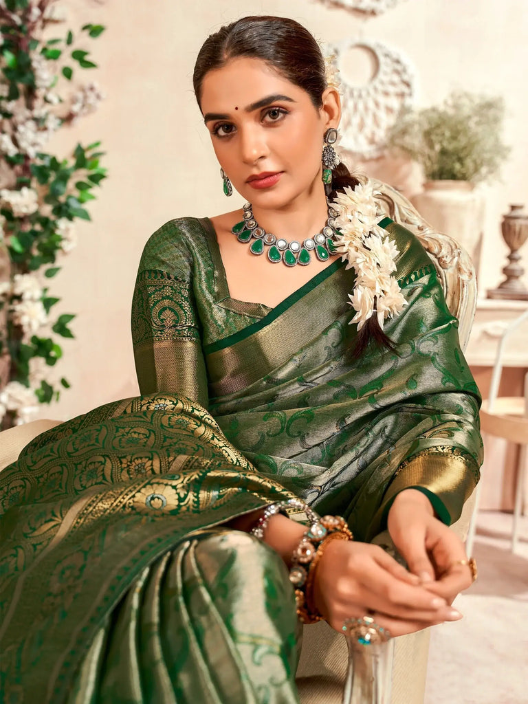 Fascinating Green Zari Weaving Silk Mehendi Wear Saree With Blouse
