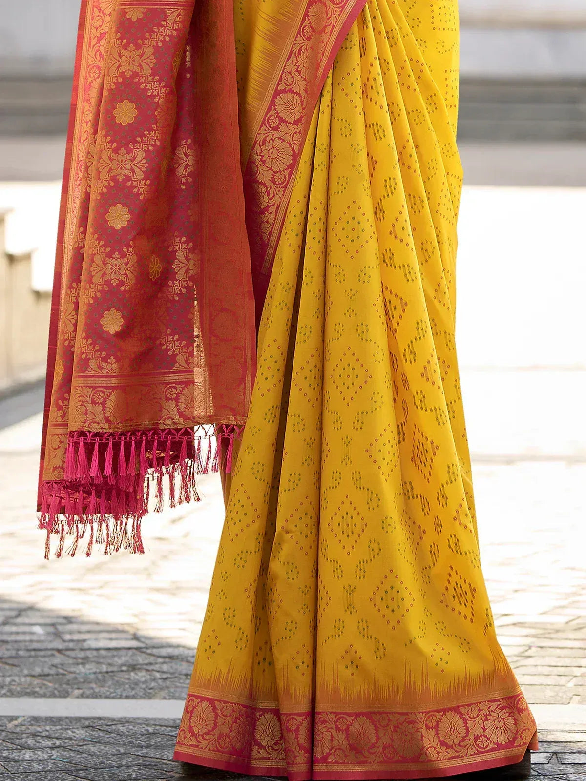 Yellow ikat saree with red gold border and floral pallu, ethnic Indian wear