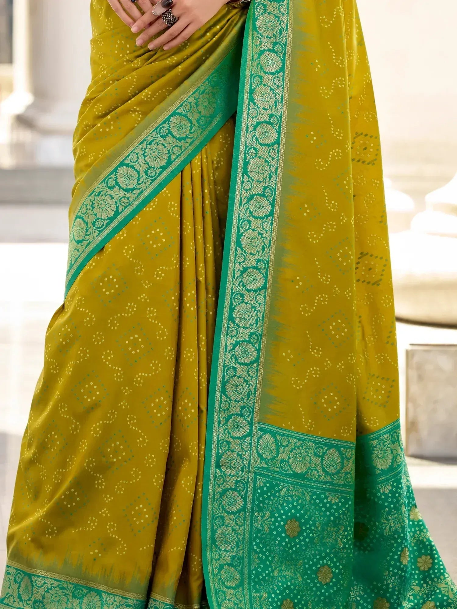 Mustard yellow saree with green floral border, elegant ethnic wear for women