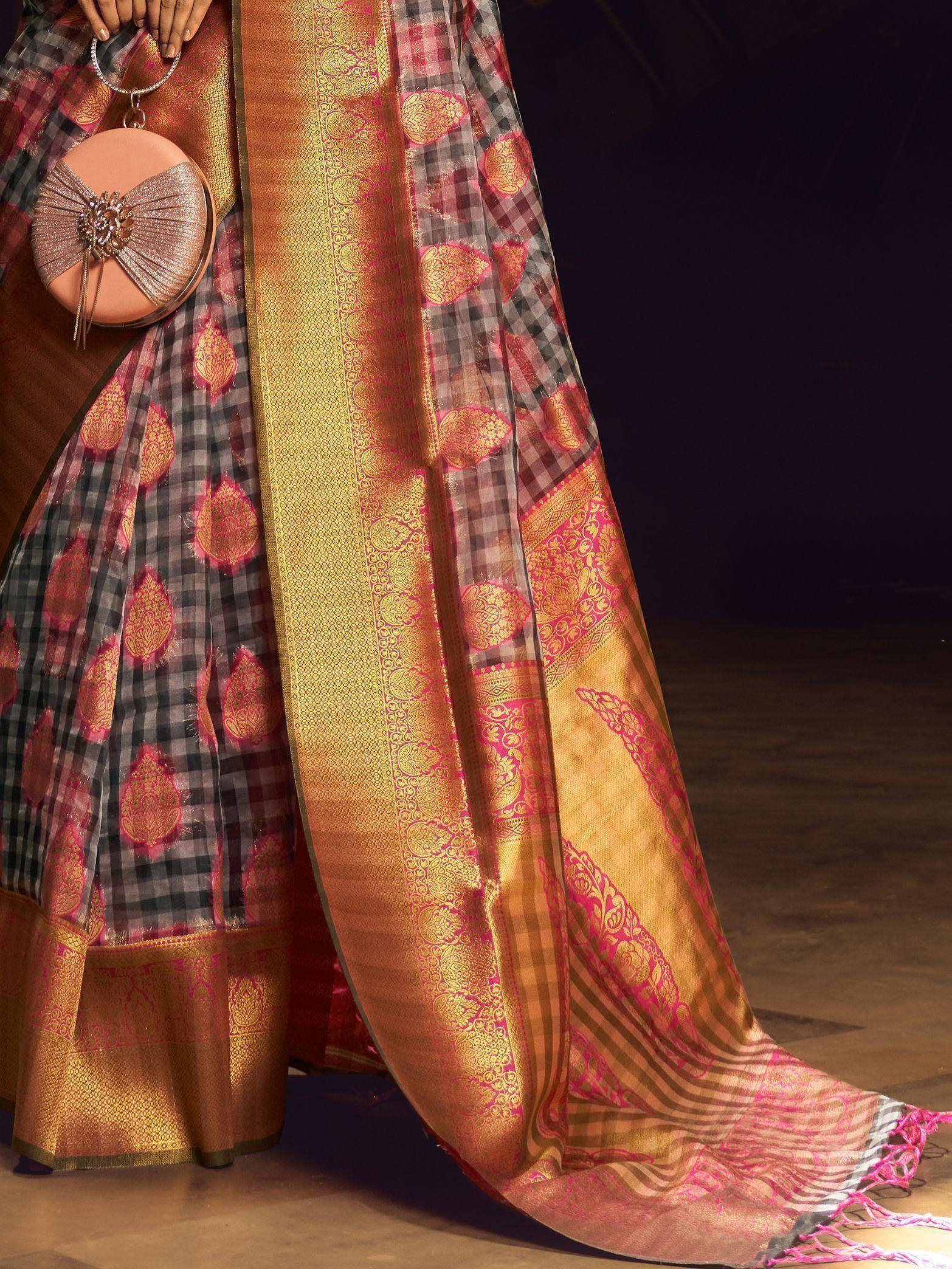 Elegant ethnic saree with checkered pink and gold paisley print, perfect for Indian occasions
