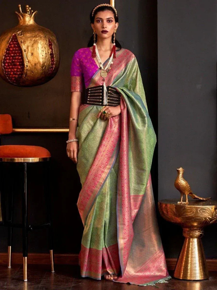 Stylish green and pink silk saree with purple blouse, perfect for Indian ethnic occasions and festive wear.