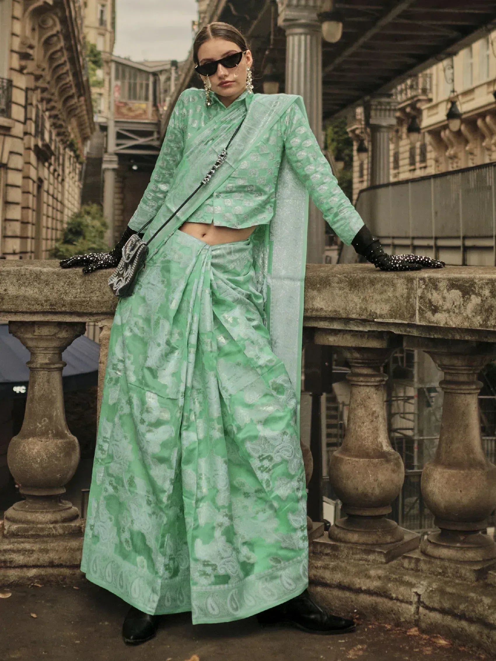 Mint green designer saree with crop top, perfect for ethnic wear and festive occasions