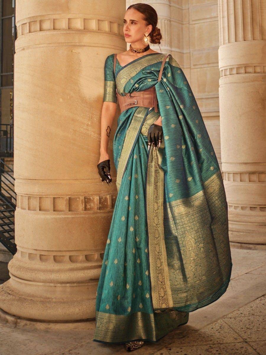 Teal designer saree with gold motifs, ethnic wear for women, styled with belt and gloves