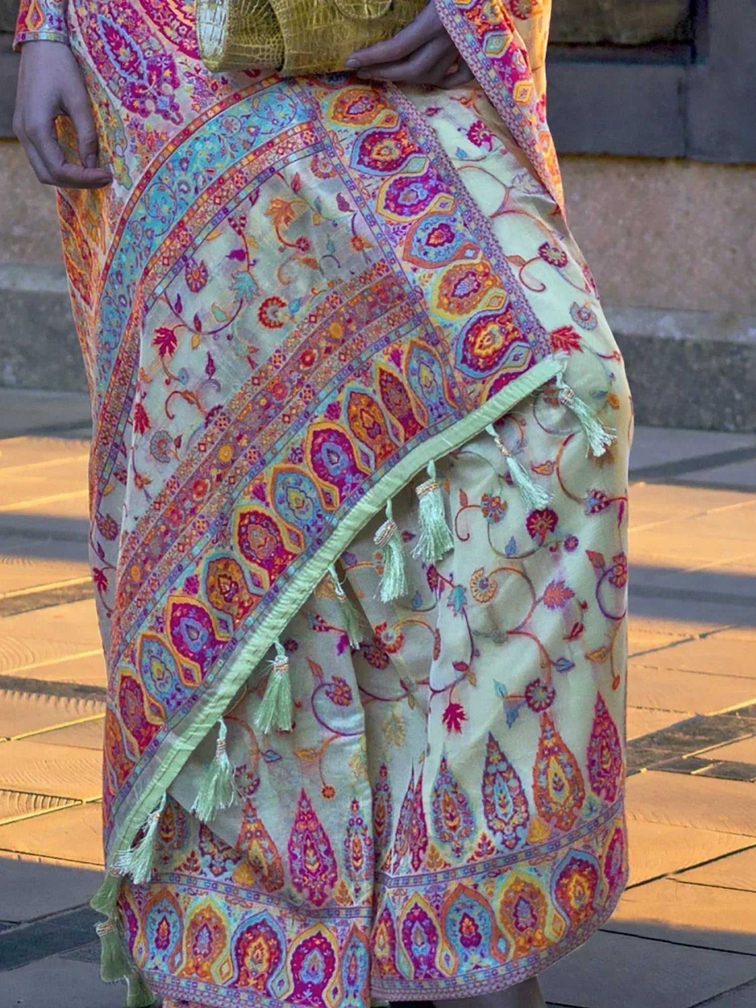 Colorful Indian saree with paisley print and tassels, perfect for ethnic wear occasions