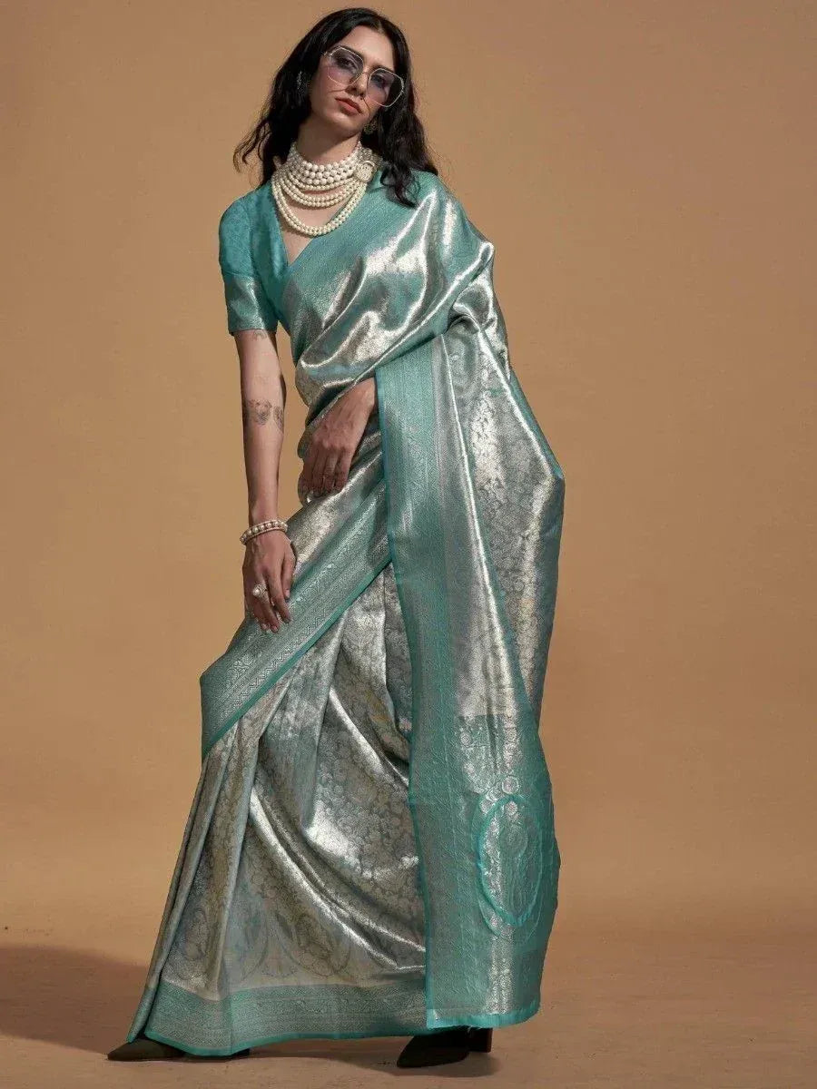 Elegant mint green saree with silver brocade, perfect for Indian ethnic wear and festive occasions.