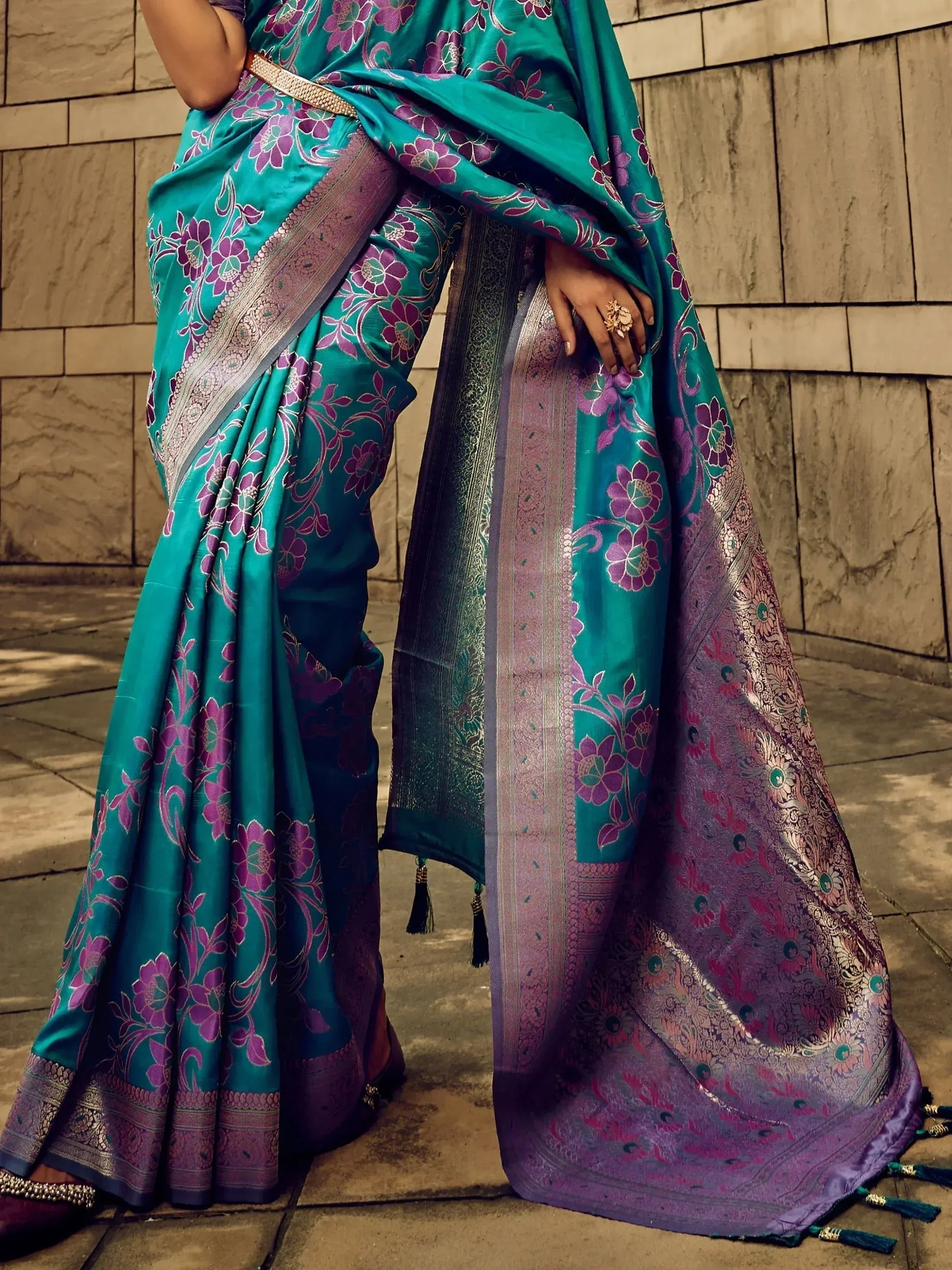Teal and purple floral saree with intricate border, perfect for Indian ethnic wear occasions