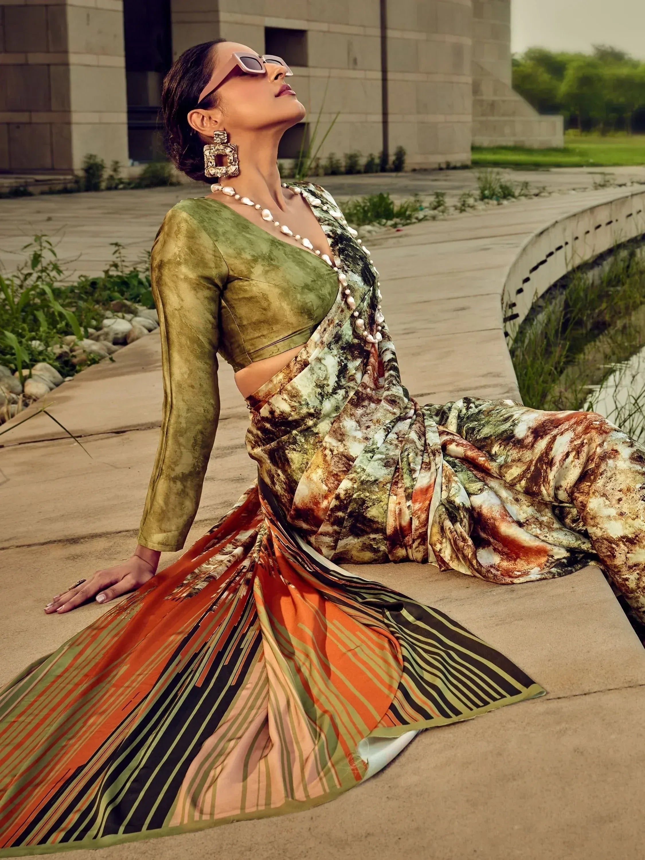 Woman in stylish printed saree with velvet blouse, ethnic wear for modern occasions