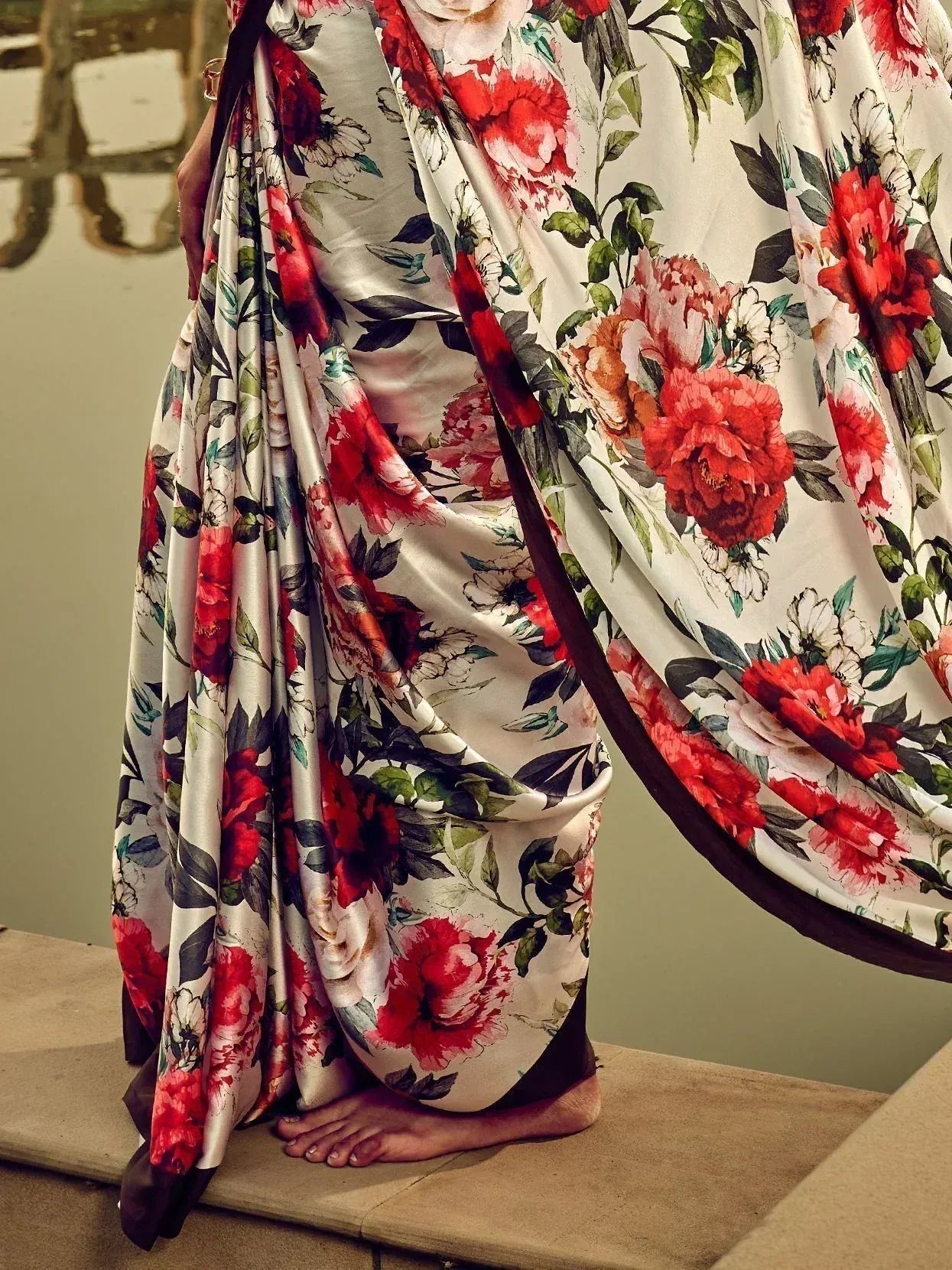 Floral print saree with red and white blooms, elegant ethnic wear for women