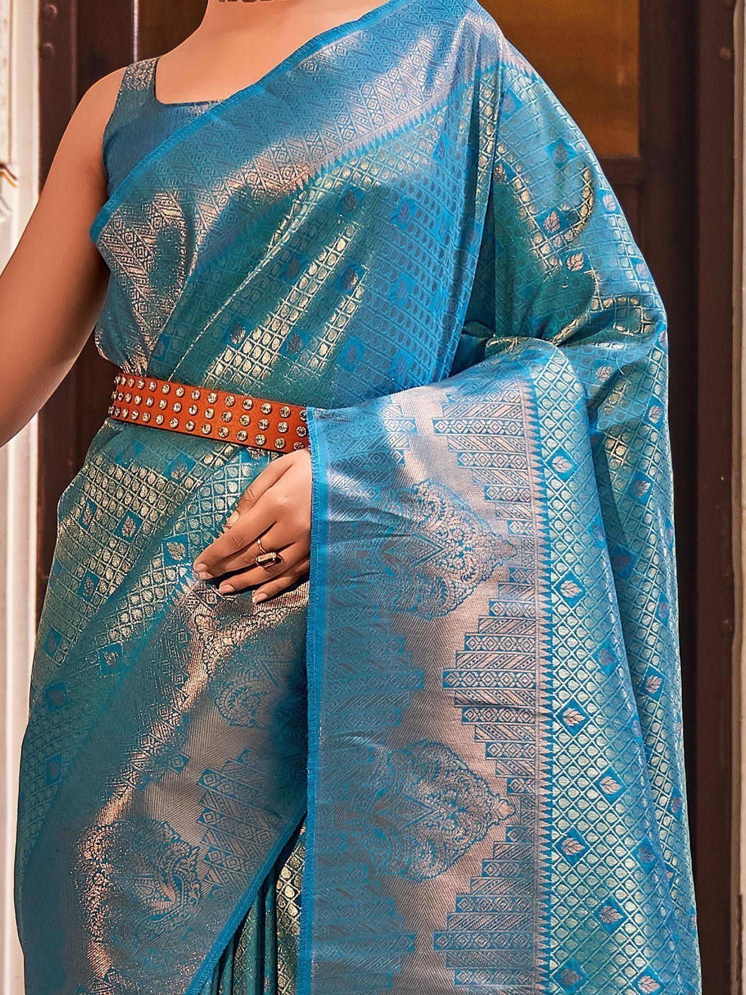 Blue designer saree with gold geometric patterns and studded belt, ethnic wear for women