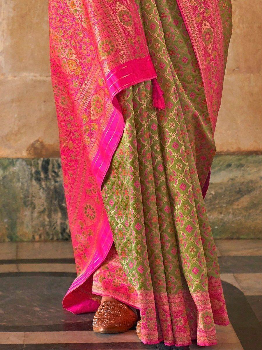 Green and pink embroidered saree with gold motifs, traditional Indian ethnic wear