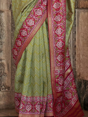 Alluring Green Patola Printed Silk Festival Wear Saree With Blouse