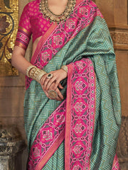 Magnetic Teal Green Patola Printed Silk Event Wear Saree With Blouse