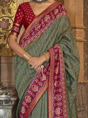Adorable Olive Green Patola Printed Silk Function Wear Saree