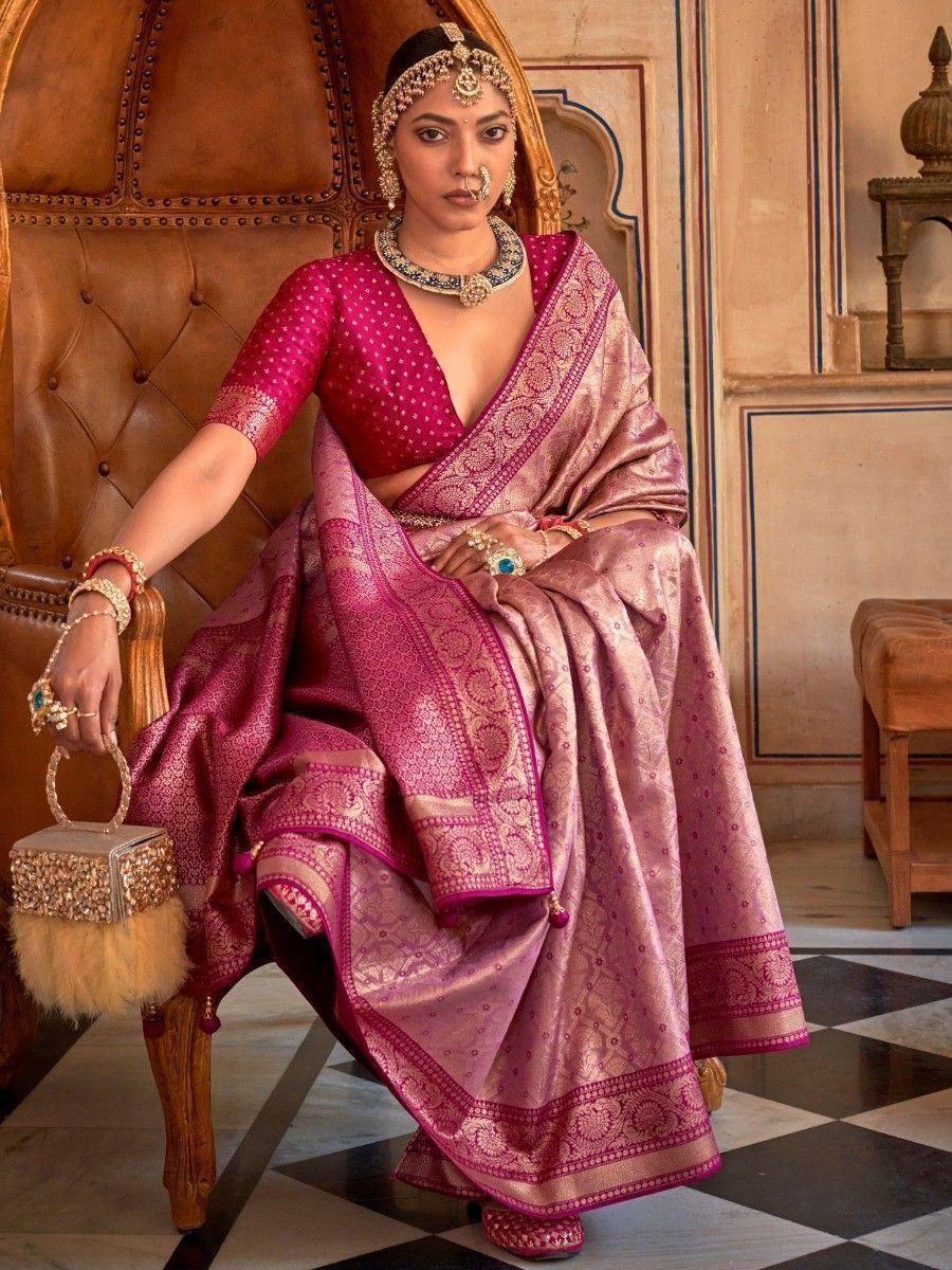 Elegant pink silk saree with gold embroidery, paired with designer blouse and traditional jewelry for Indian ethnic wear