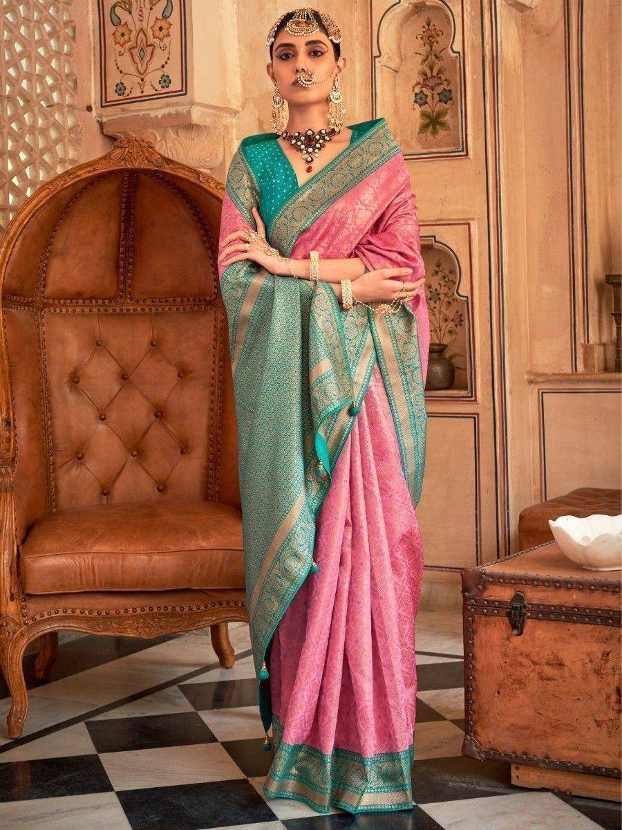 Pink and teal designer saree with intricate embroidery, perfect for Indian ethnic wear occasions
