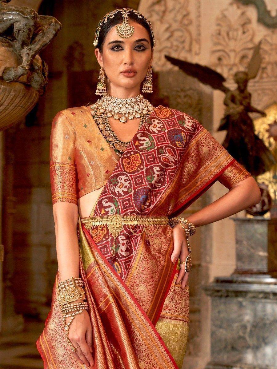 Elegant Indian saree with intricate embroidery and traditional jewelry for festive occasions