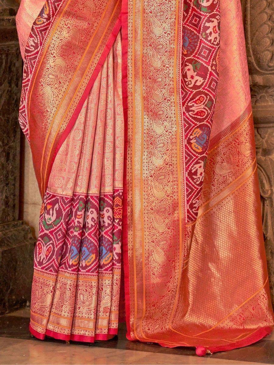 Pink and gold designer saree with intricate paisley and temple motifs, perfect for Indian ethnic wear