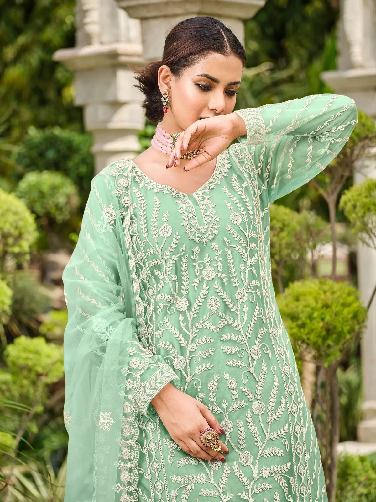 Mint green embroidered ethnic kurta with floral detailing, perfect for Indian wear and festive occasions.