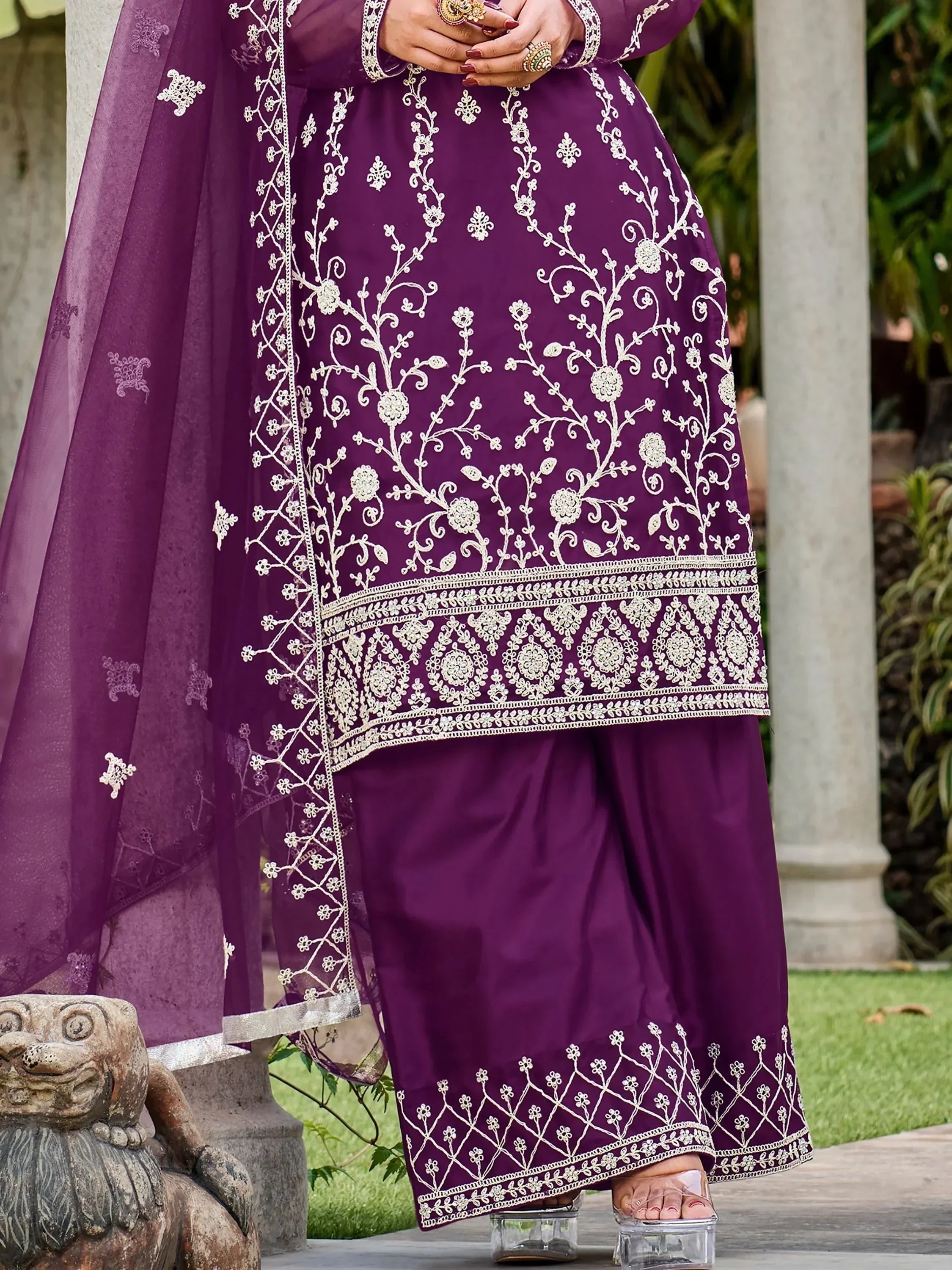 Purple salwar kameez with intricate white embroidery and sheer matching dupatta