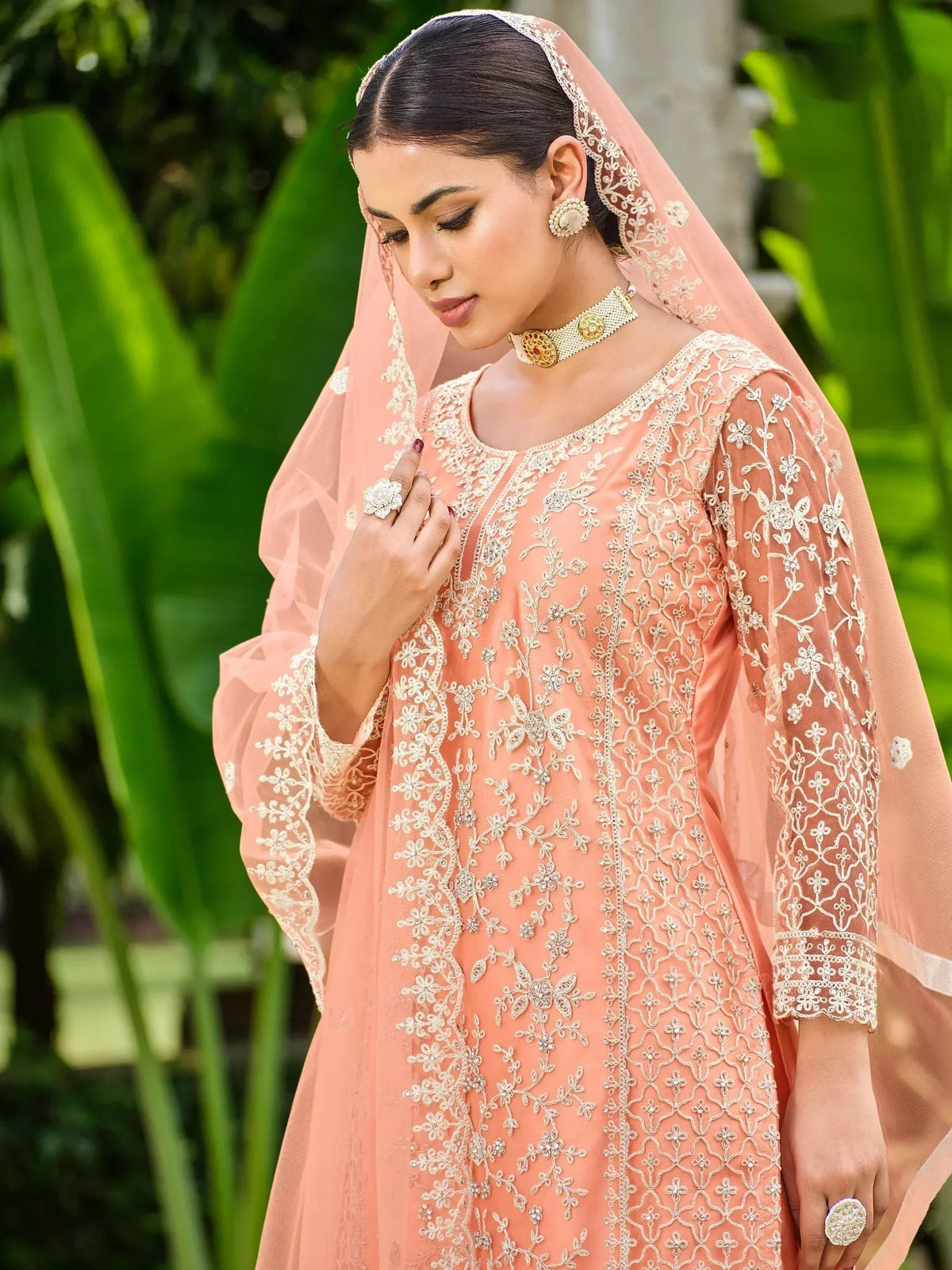 Elegant peach embroidered salwar kameez with floral lace and matching dupatta for Indian ethnic wear