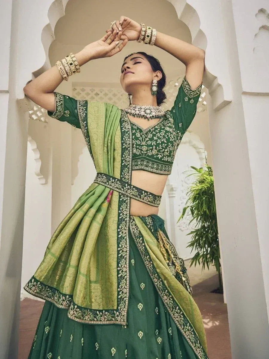 Green embroidered lehenga choli with dupatta, traditional Indian ethnic wear for women