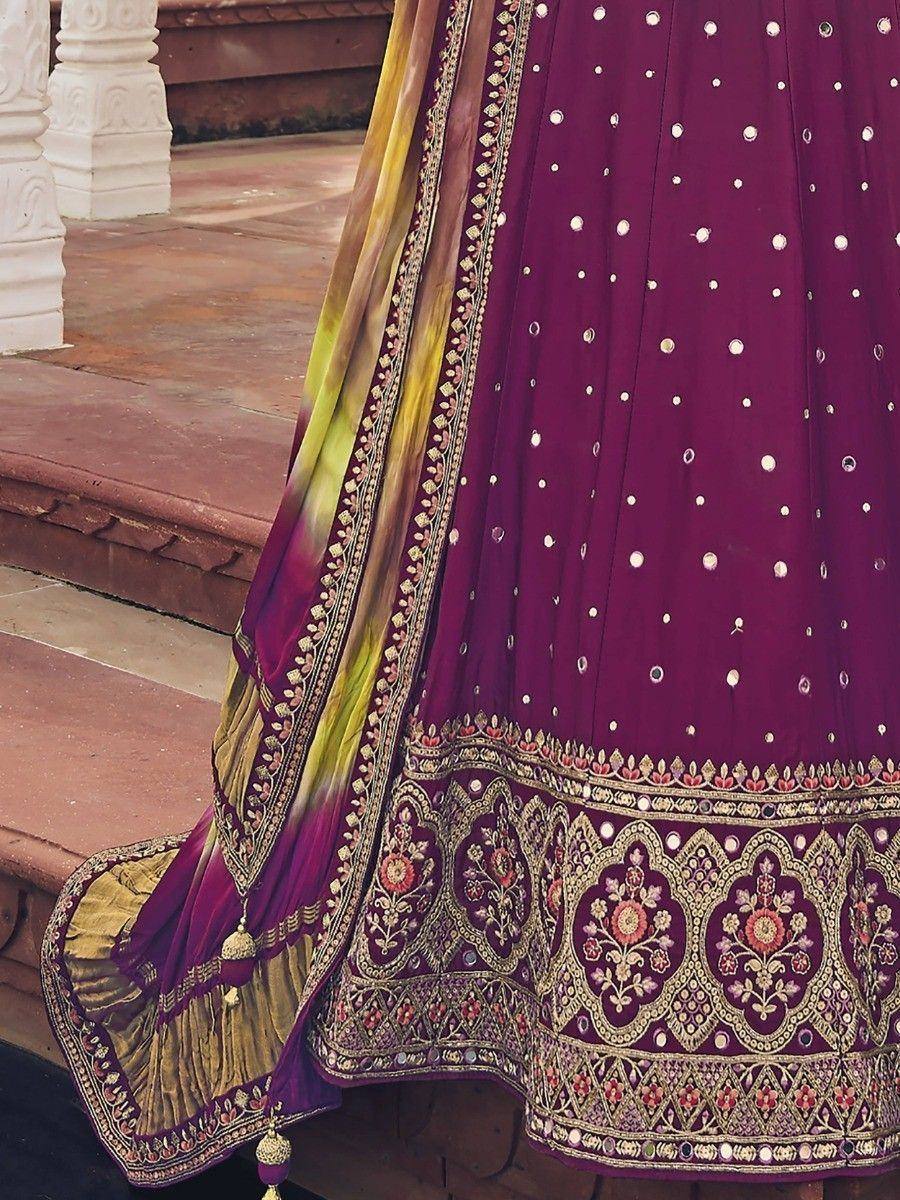 Purple lehenga choli with gold embroidery and mirror work, paired with ombre dupatta for Indian ethnic wear