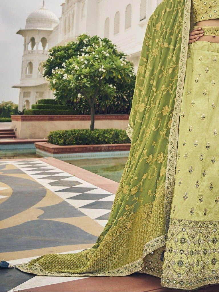 Ravishing Green Embroidered Silk Mehendi Wear Lehenga Choli