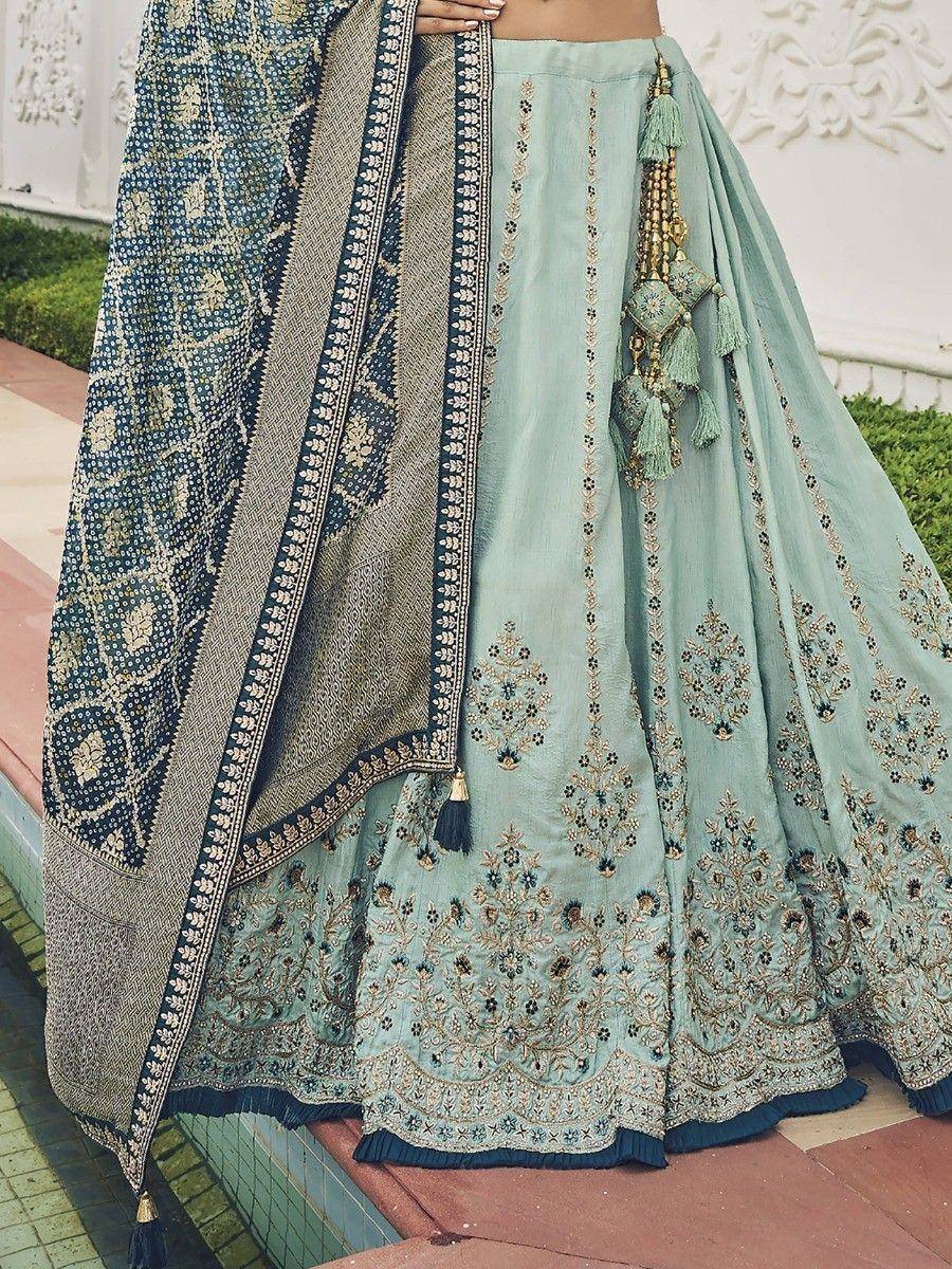 Mint green embroidered lehenga choli with blue dupatta, perfect for Indian ethnic wear occasions