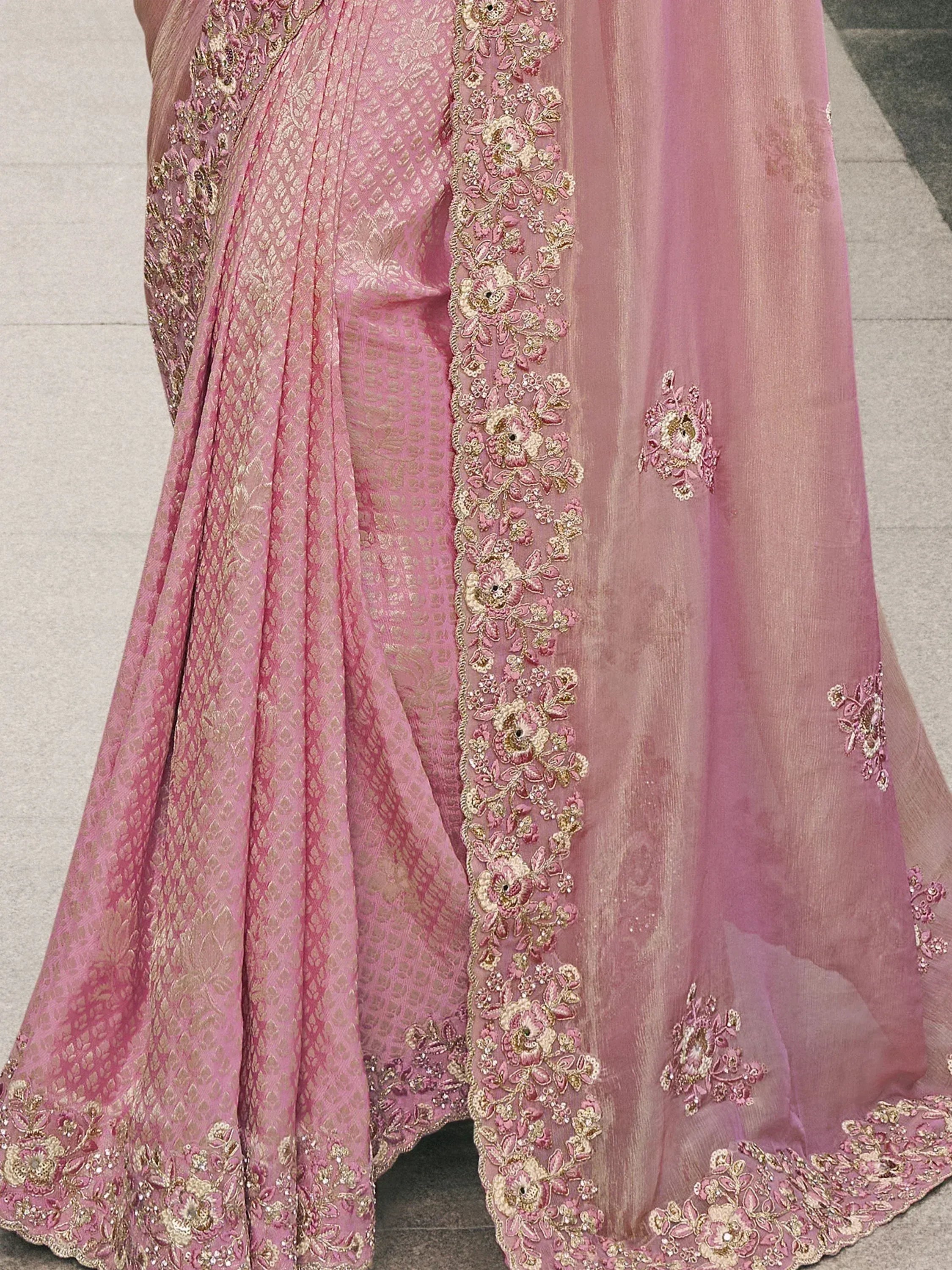 Pink designer lehenga choli with gold floral embroidery and sheer dupatta for Indian ethnic wear