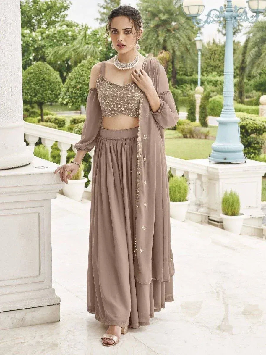 Elegant beige ethnic sharara set with sequin crop top and dupatta, perfect for Indian weddings or parties