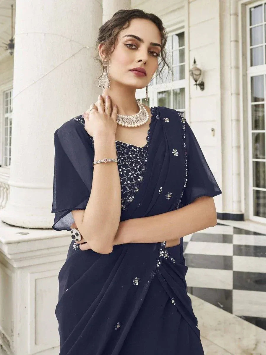 Navy blue designer saree with sequin embroidery, perfect for ethnic occasions and Indian weddings.