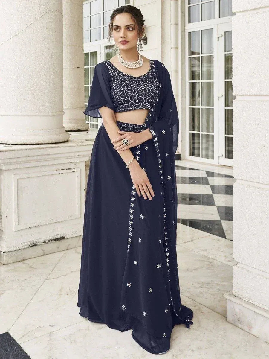 Navy blue designer lehenga choli with floral embroidery, perfect for Indian ethnic wear occasions