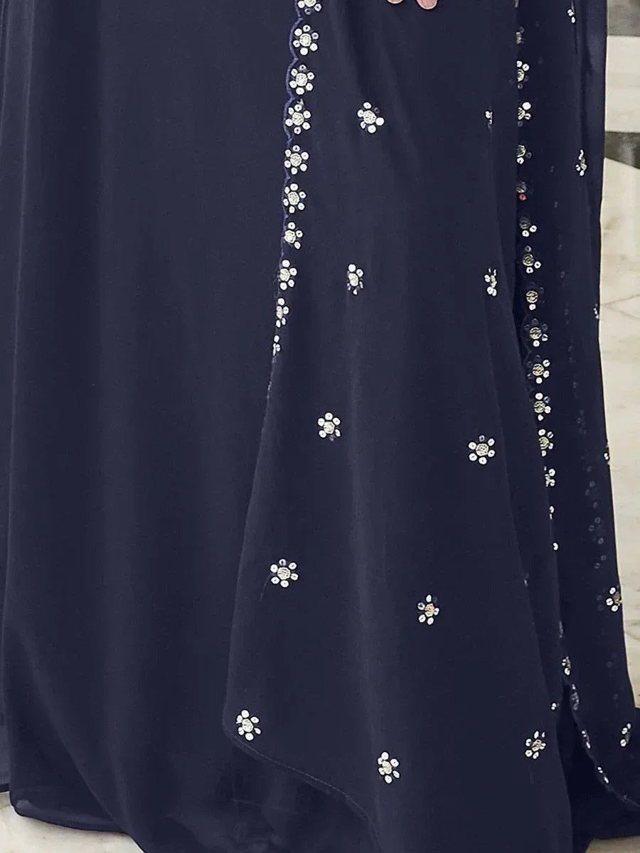 Navy blue ethnic gown with floral sequin embroidery, perfect for Indian festive occasions.