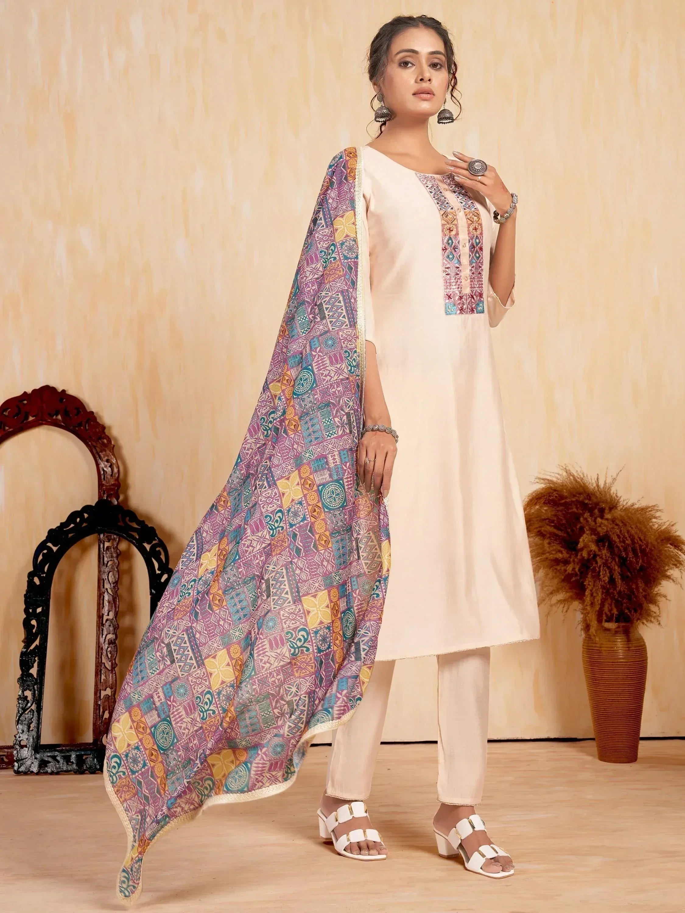Cream ethnic kurta with colorful printed dupatta, perfect for Indian wear occasions